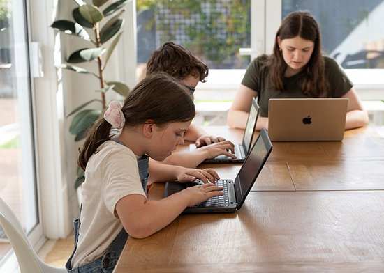Kids on laptops